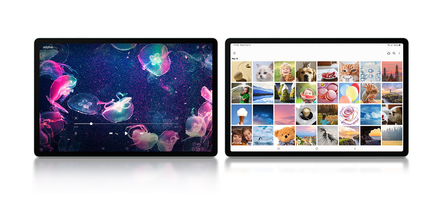 Dwa tablety Samsung Galaxy Tab S9 FE pokazane przodem, ustawione obok siebie. Na tablecie po lewej odtwarzane jest wideo z różowo-niebieskimi meduzami. Na urządzeniu po prawej przedstawiona jest galeria różnych zdjęć – zwierząt, krajobrazów i innych.